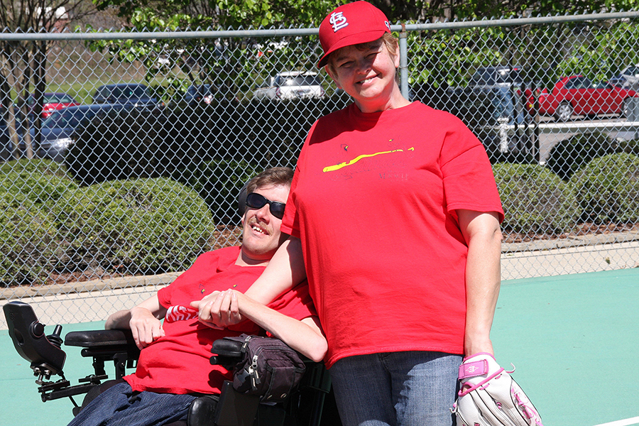 Bertha Maddox of the Cardinals stands next to Matt Cunningham waiting for the next hit their way - Moody Miracle League